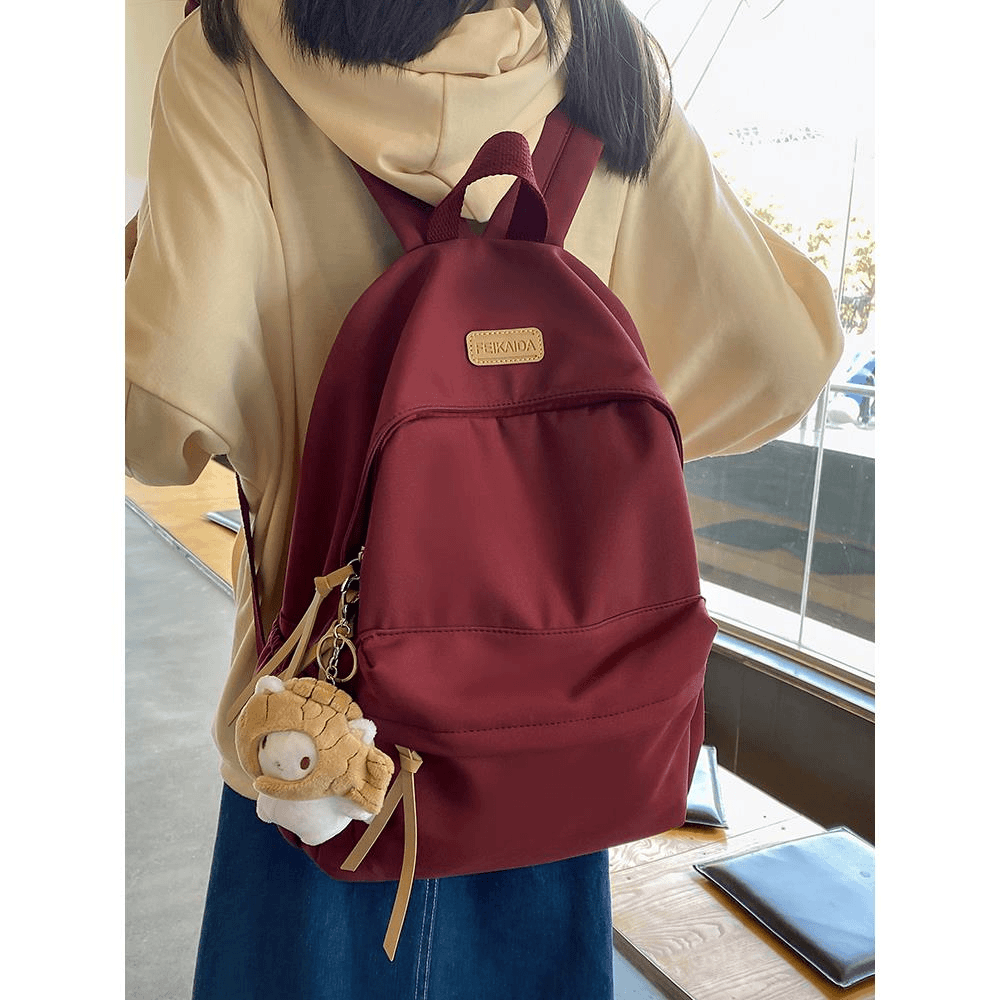 初中生书包女红色简约小众背包日系轻便女生高中大学生双肩包