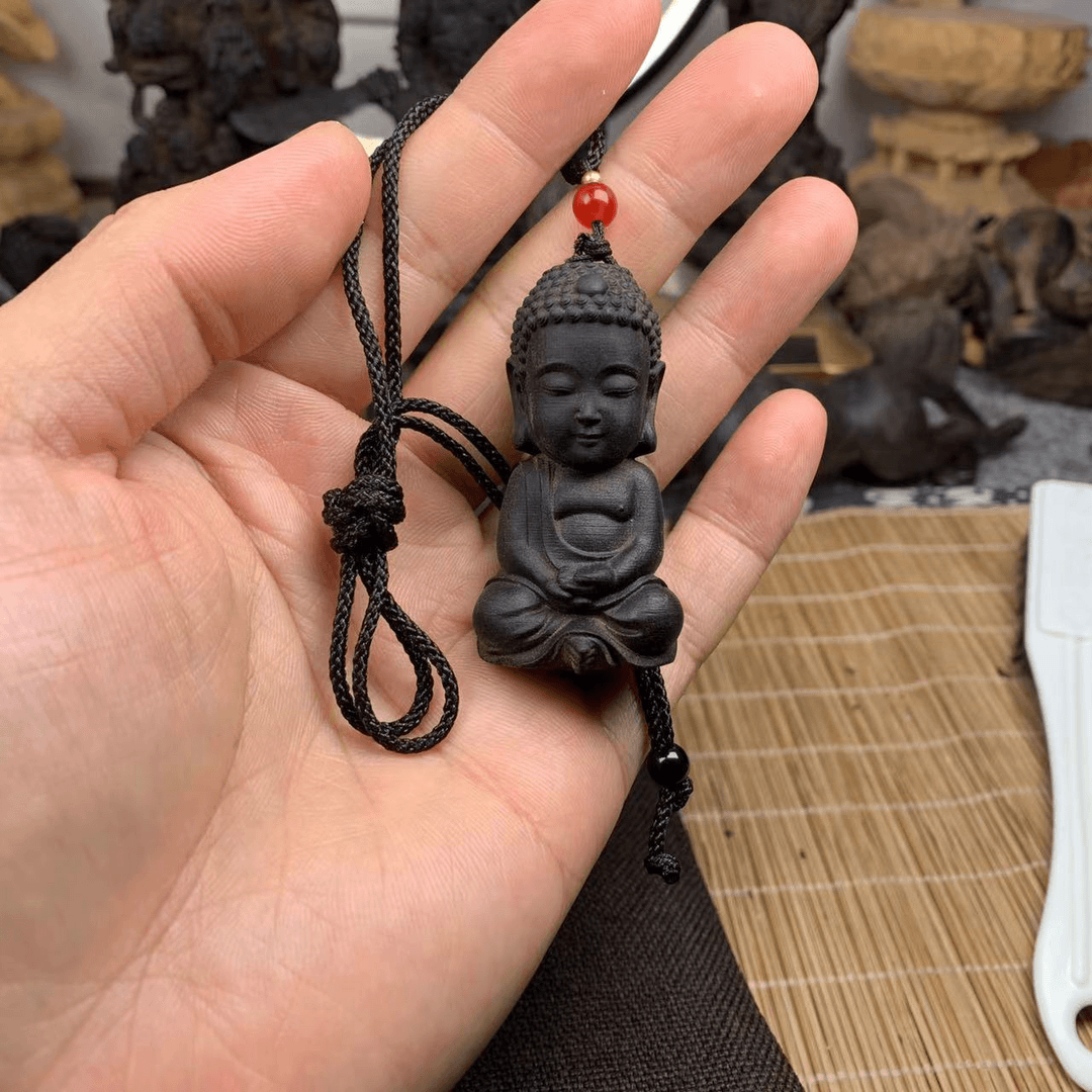 宝宝佛199 产地印尼达拉干木雕木艺把玩件挂件 颜色有深浅随机发