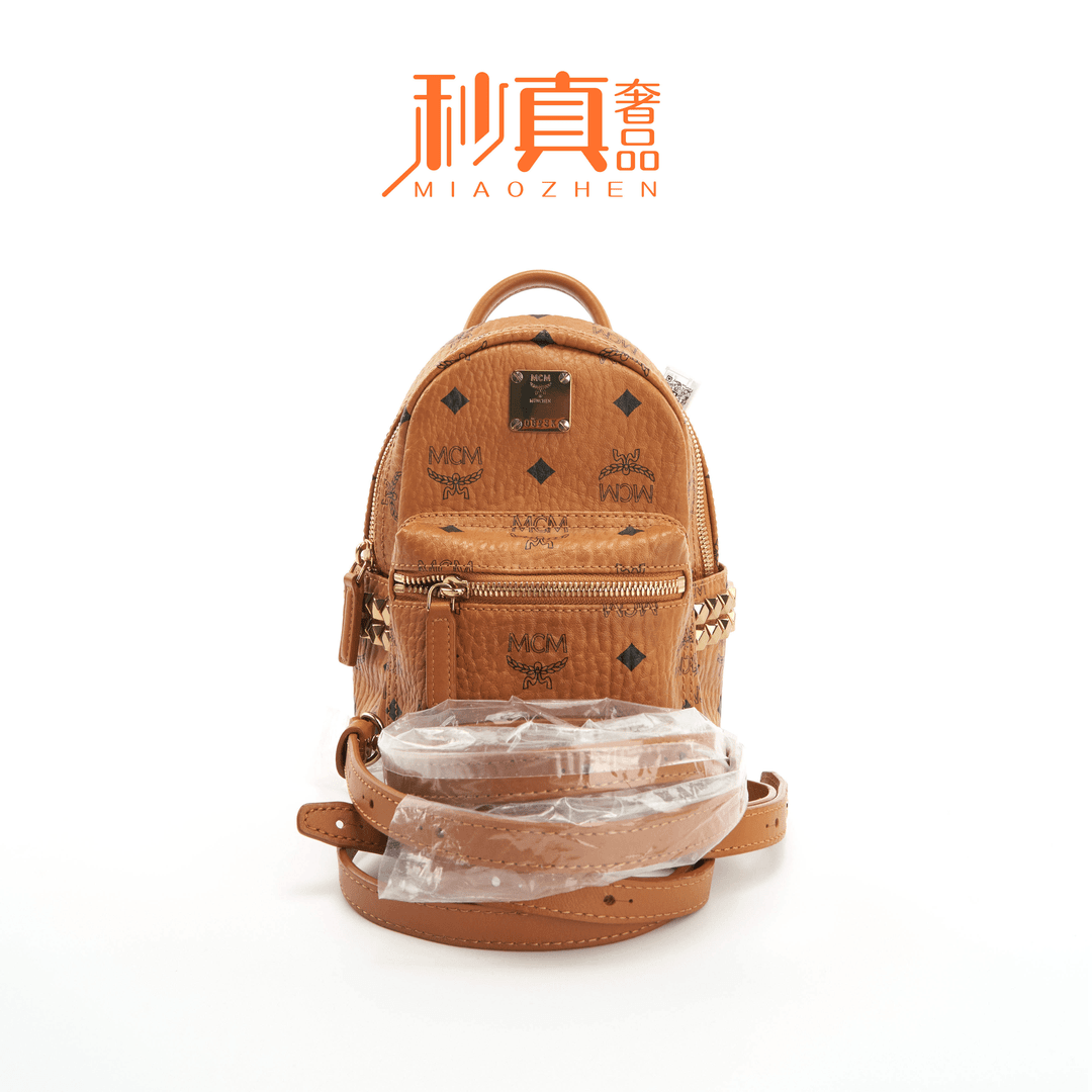 95新  秒真奢品/MCM/99新/ 侧边铆钉双肩背包/公价7200/31009W